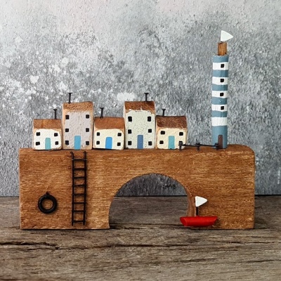 Miniature Lighthouse & Cottages on Bridge